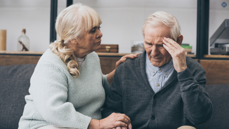 Senior Alzheimers sufferer with his wife