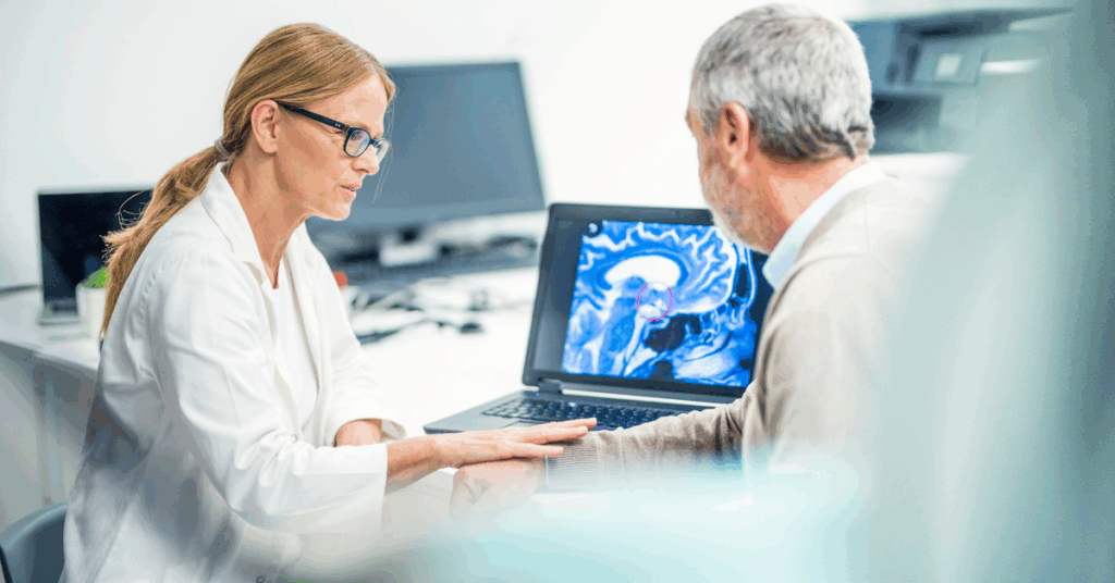 An image of a medical professional explaining a brain scan to a patient