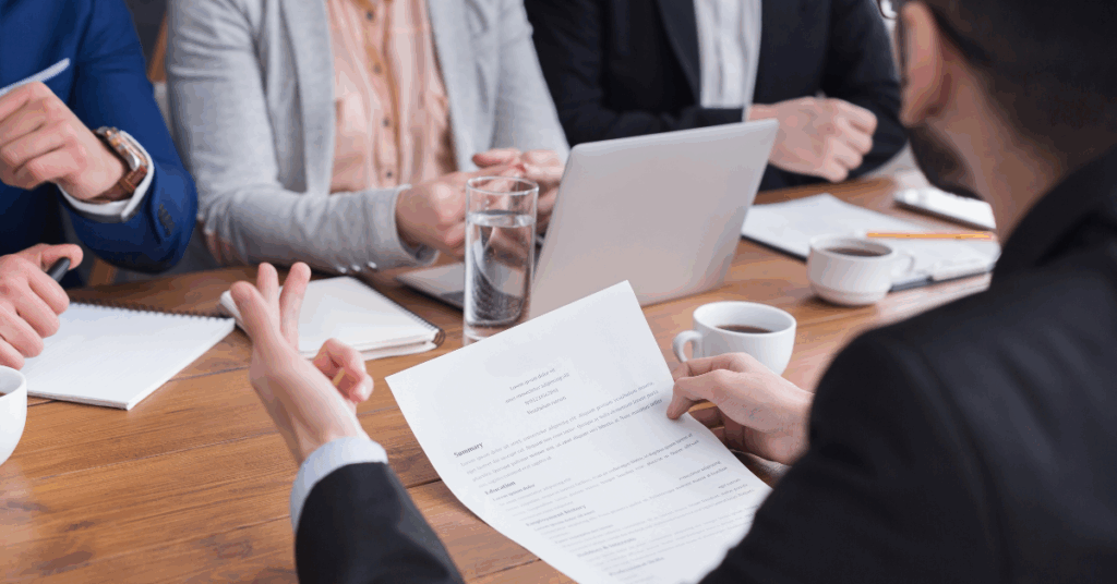 image of a meeting for an article about CQC inspection and regulations